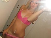 Blonde chick selfshooting in pink lingerie