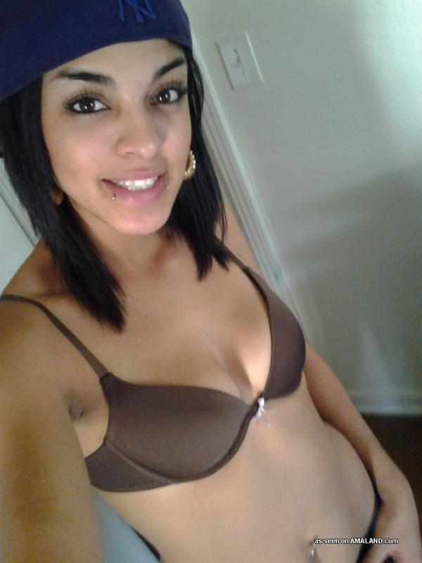 Latina babe shows off her tight body