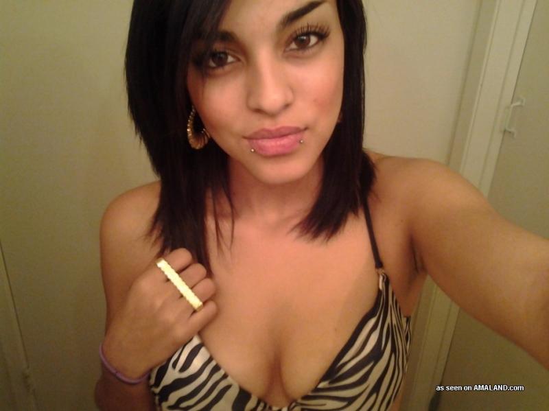 Latina babe shows off her tight body