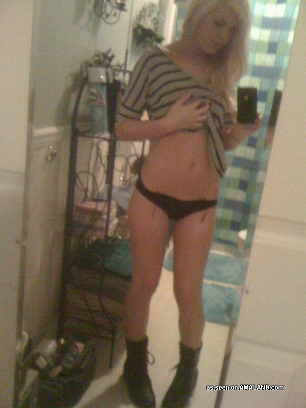Punk chick strips naked while camwhoring
