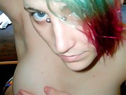 Punk chick posing naked in the room
