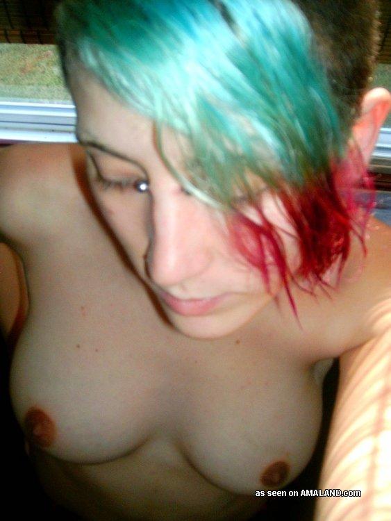 Punk chick posing naked in the room