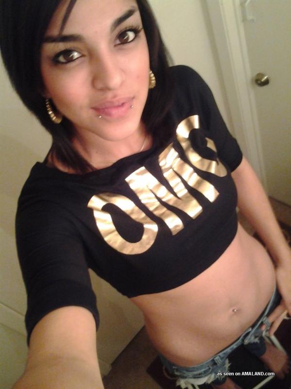 Latina babe shows off her tight body