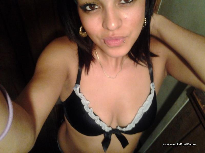 Latina babe shows off her tight body