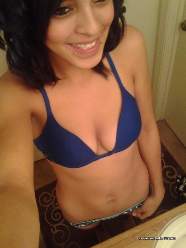 Latina babe shows off her tight body