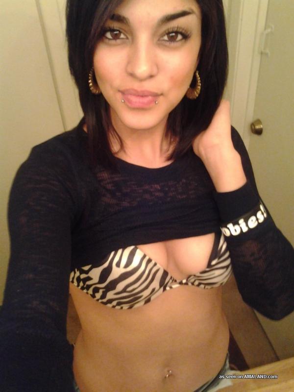 Latina babe shows off her tight body