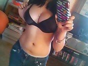 Kinky girlfriend displays her round breasts