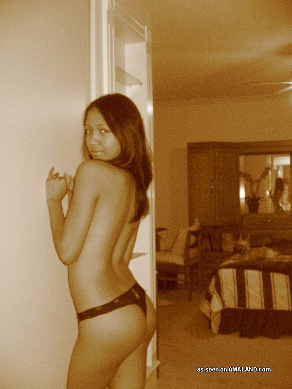 Asian chick displays her sexy body
